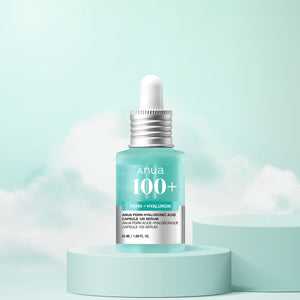 Anua 100+ serum bottle with dropper on a light blue background