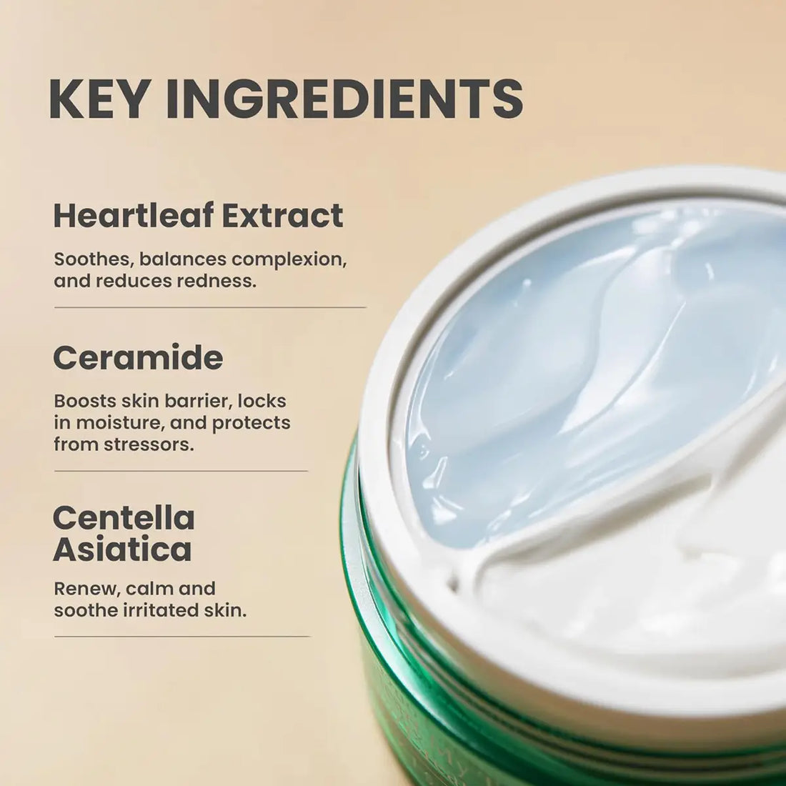 Cosmetic jar with cream and key ingredients listed on a beige background