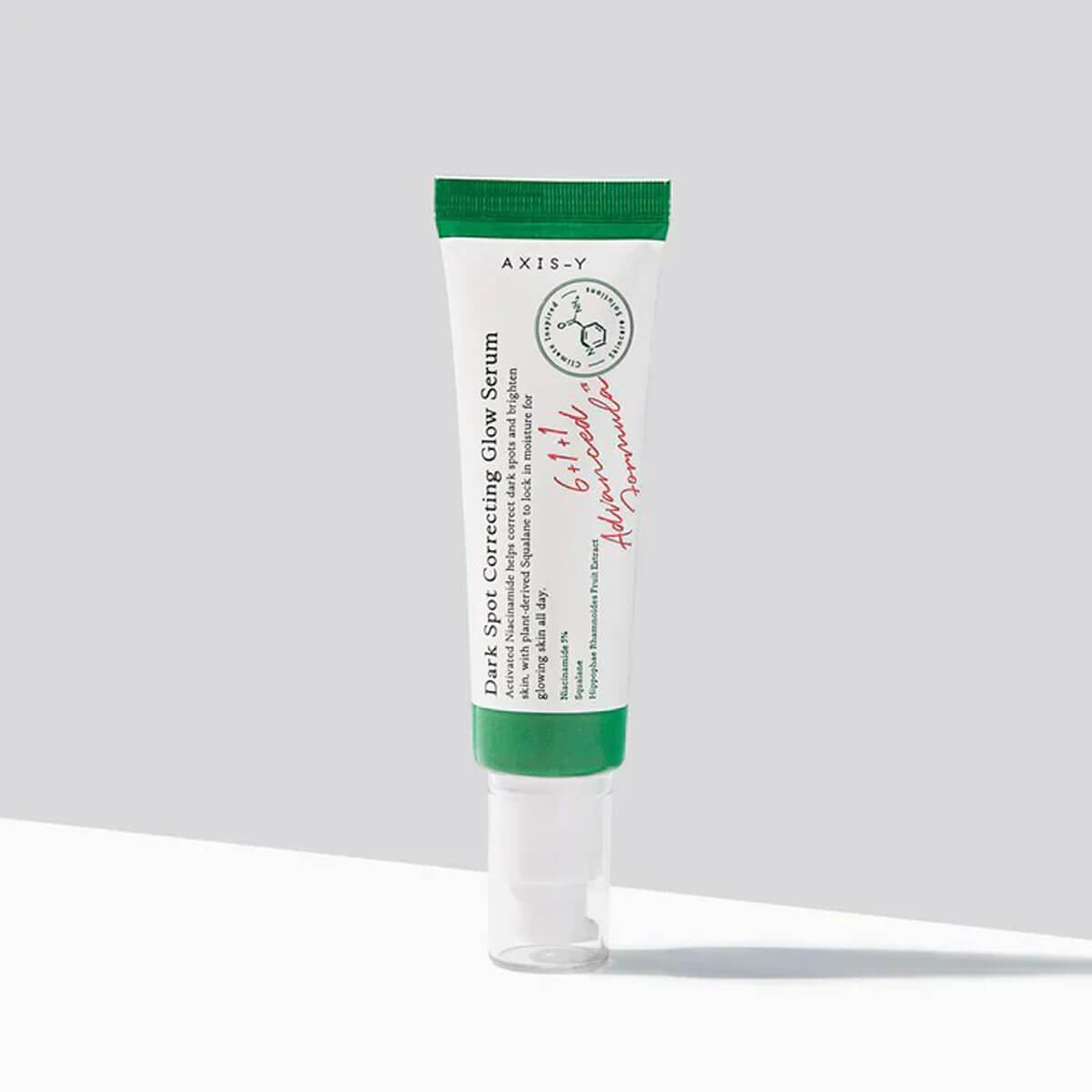 Tube of Axis-Y dark spot correcting serum on a light gray background