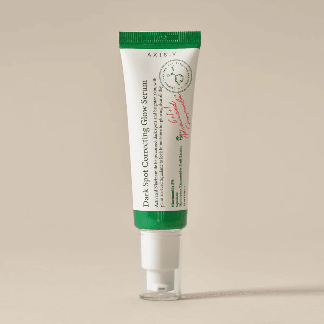 Tube of Axis-Y Dark Spot Correcting Glow Serum on a beige background