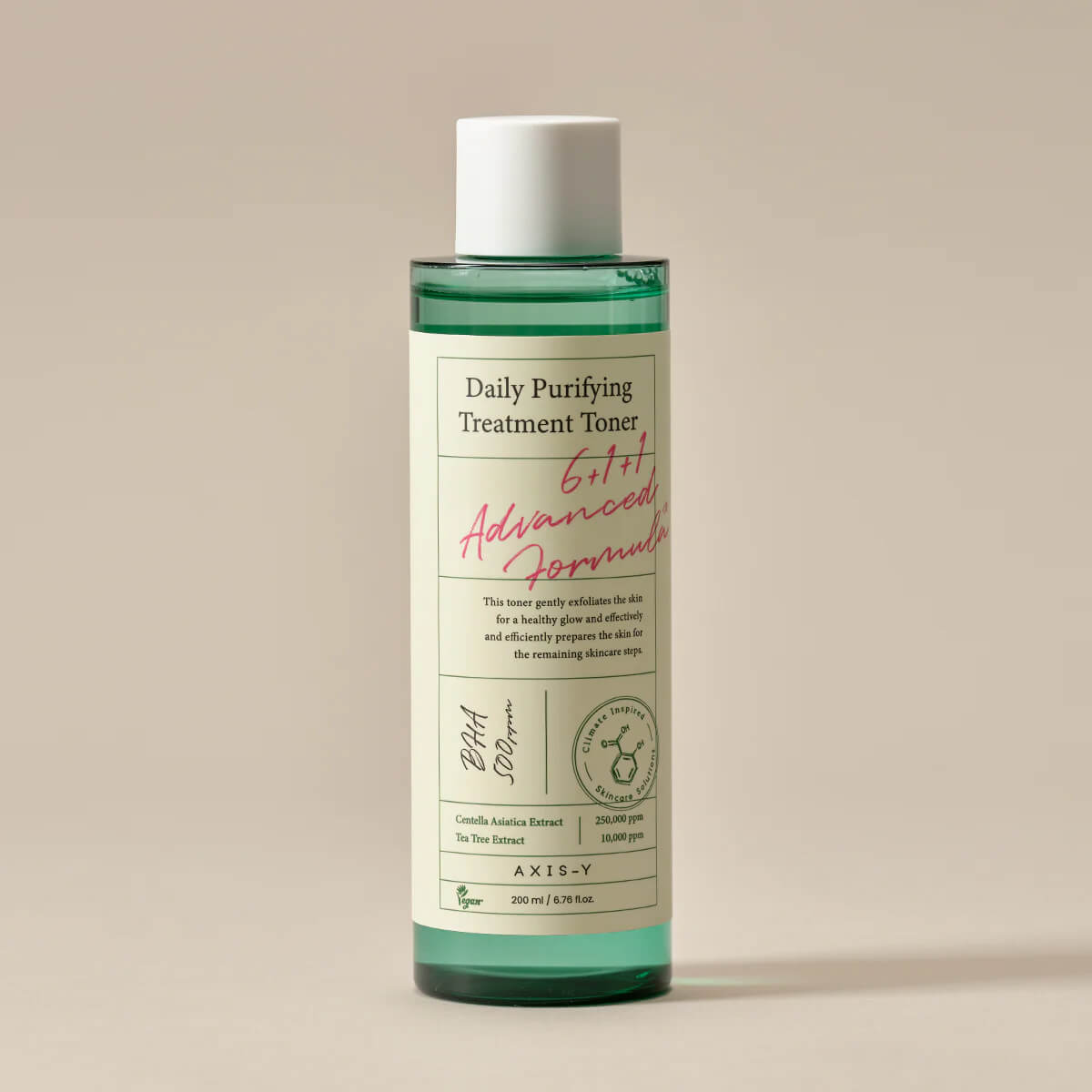 Bottle of 'Daily Purifying Treatment Toner' on a beige background