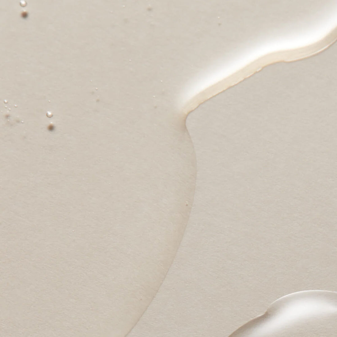 Close-up of a white ceramic tile with a subtle texture