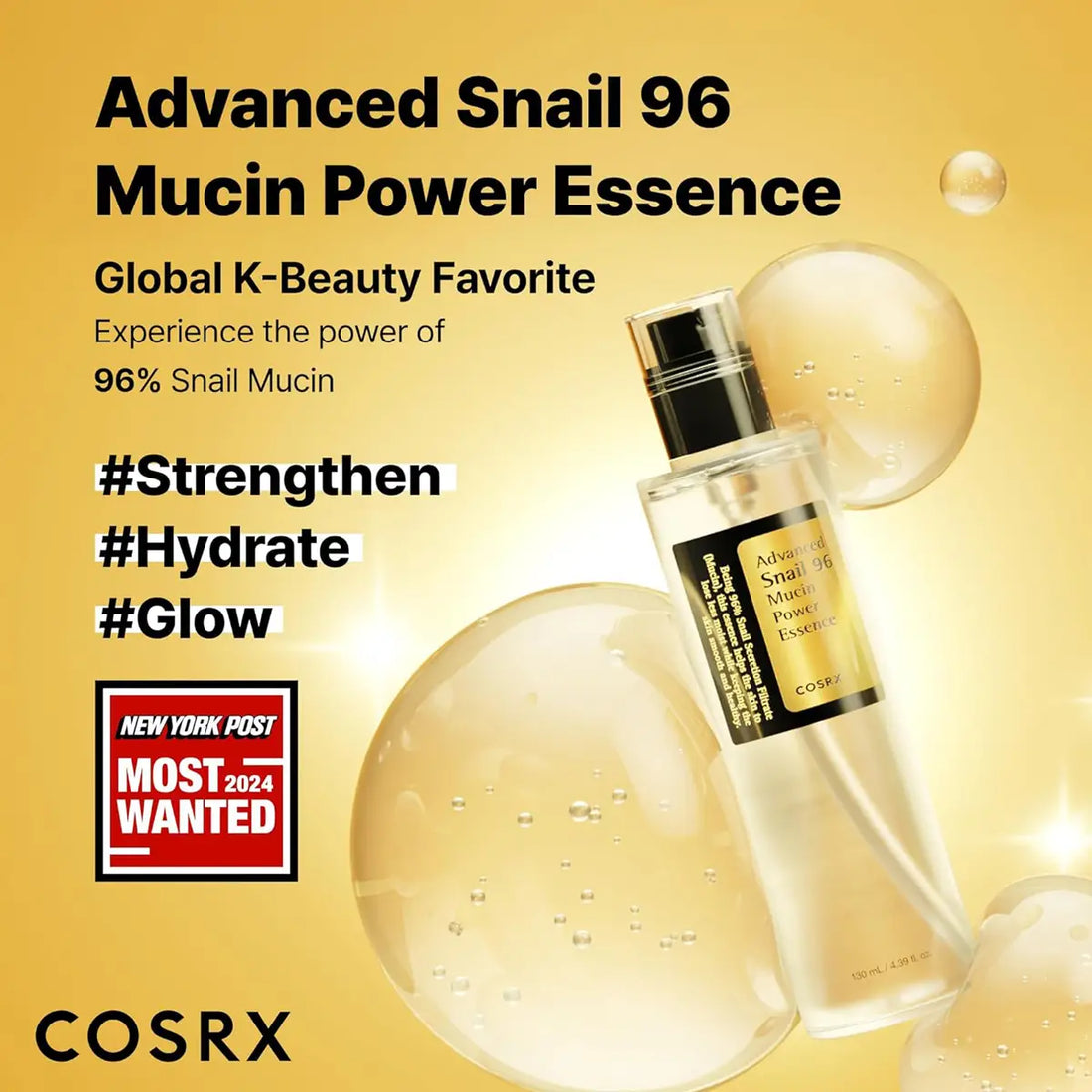 COSRX Advanced Snail 96 Mucin Power Essence bottle with snail mucin spheres on a yellow background.