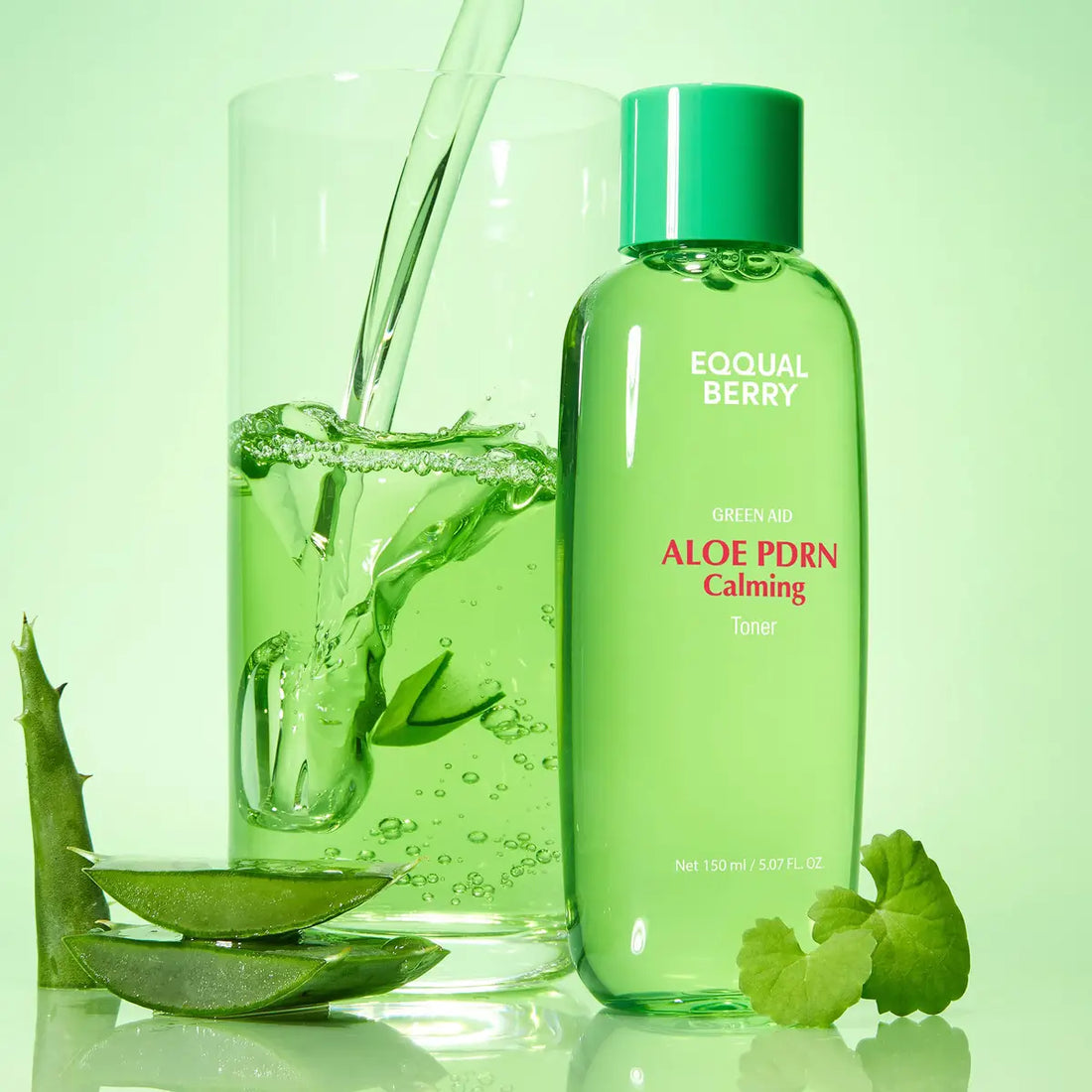 Green bottle of Eqqualberry Aloe PDRN Calming Toner with a glass of water and aloe vera leaves on a green background