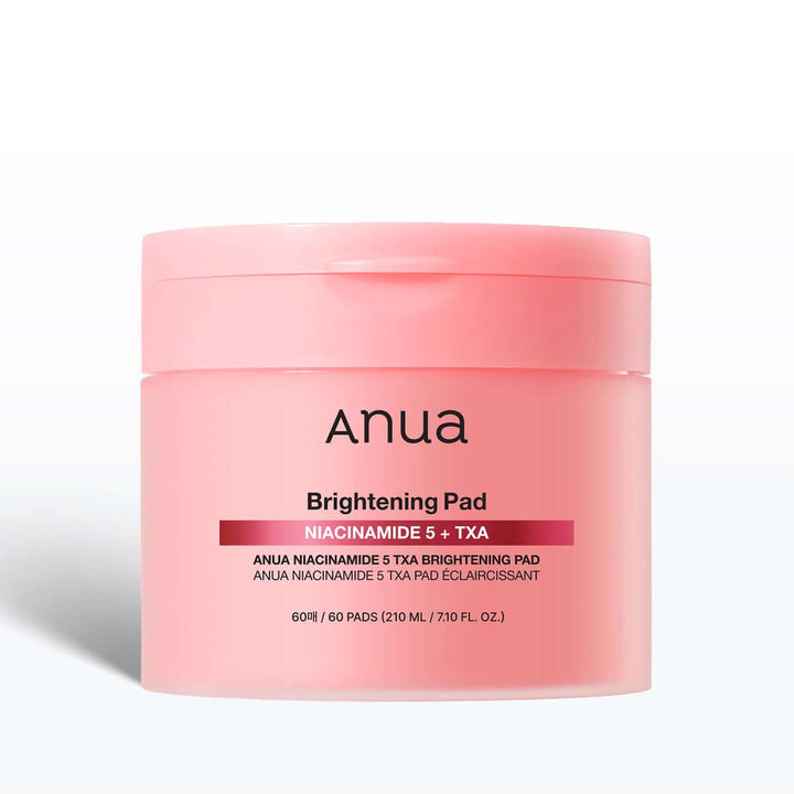 Pink jar of Anua Brightening Pad on a white background