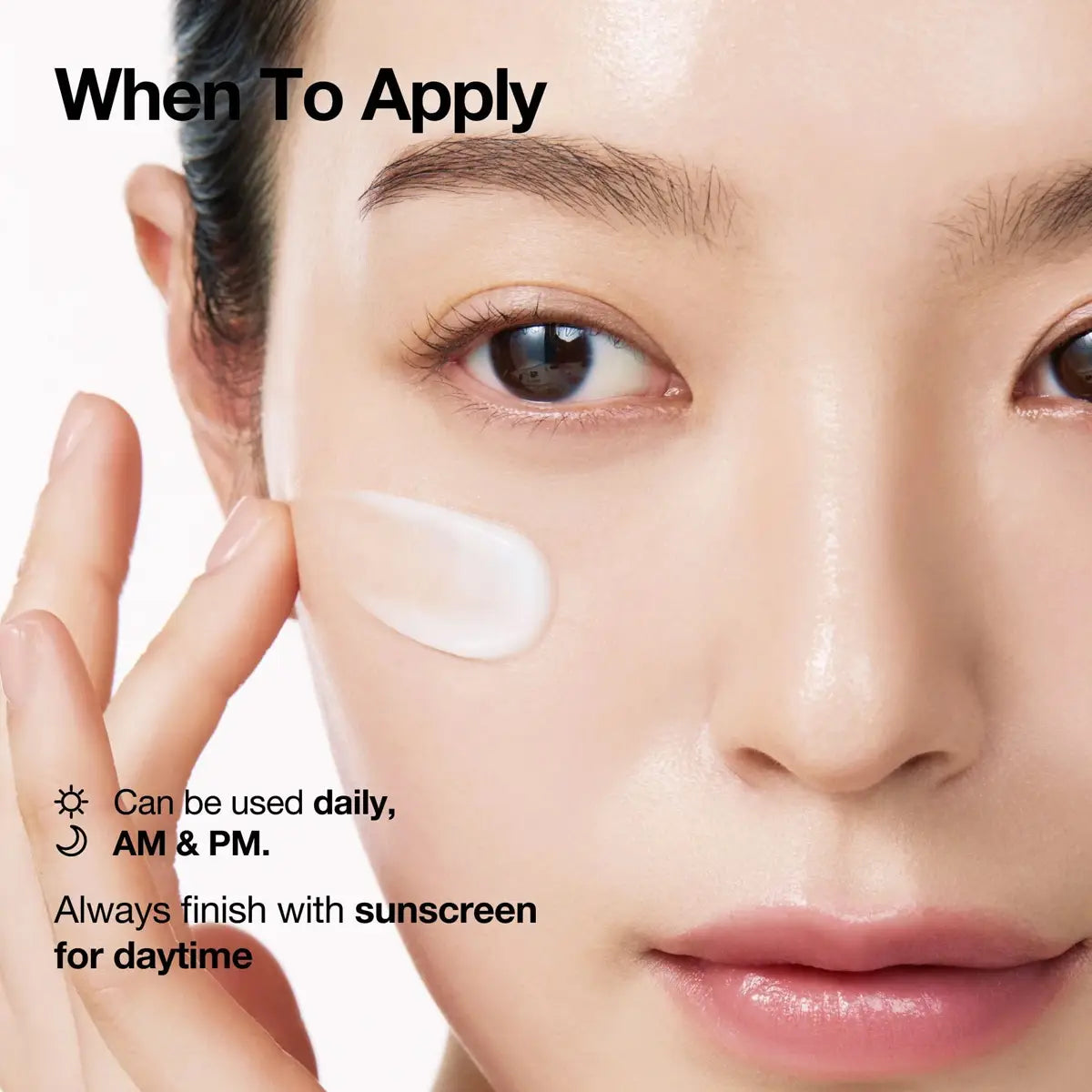 Close-up of a person applying cream to their face with text about application times.