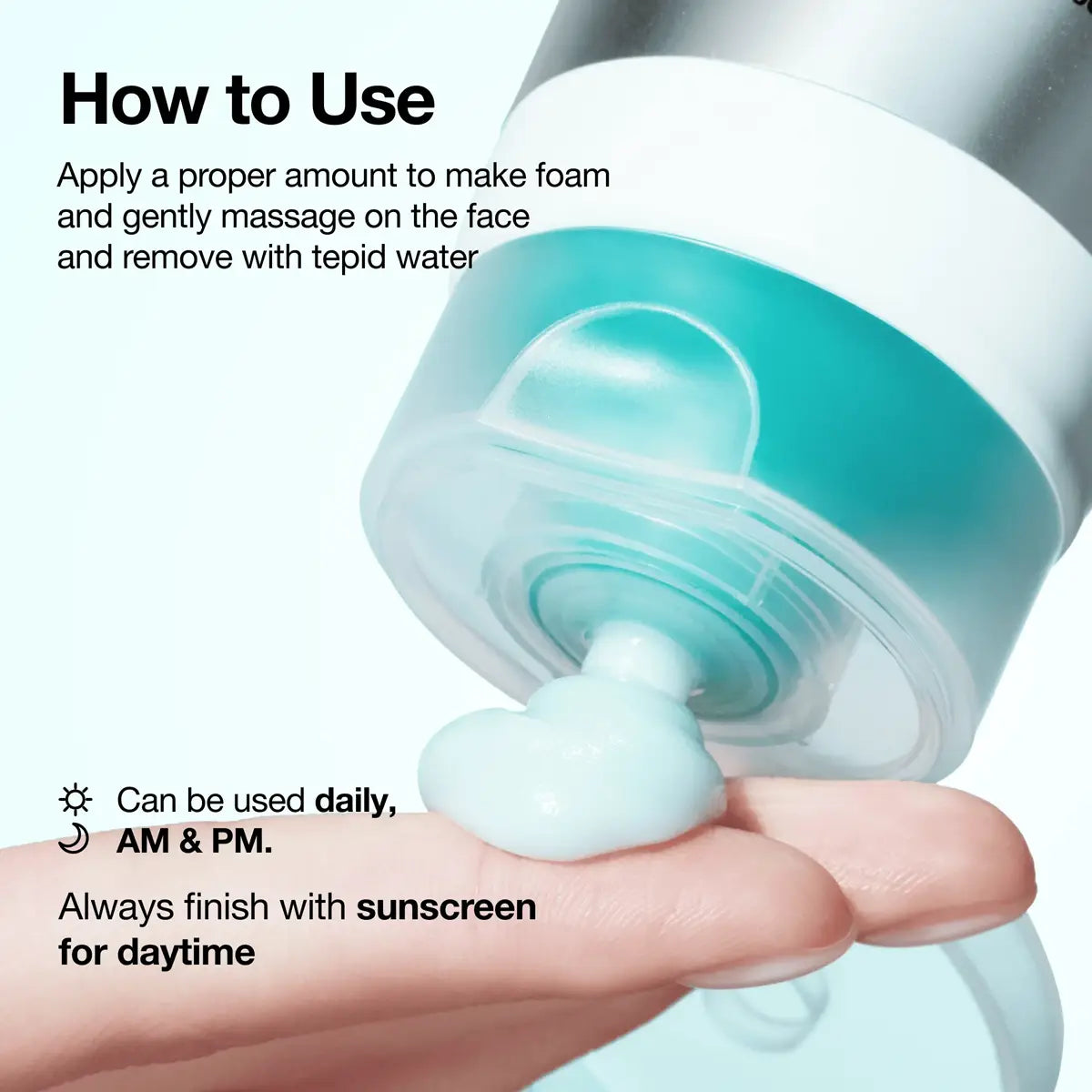 A close-up of a hand holding a small bottle and receiving a white foam product, with overlaid text reading 'How to Use' and bullet points on a dark background.