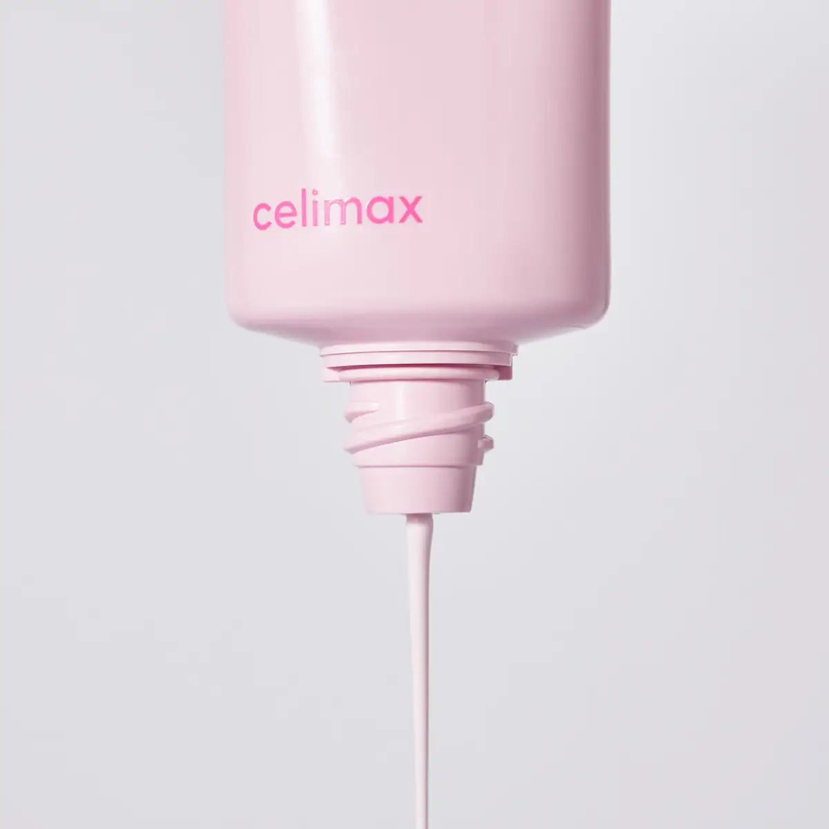 Pink bottle with 'celimax' branding on a light gray background