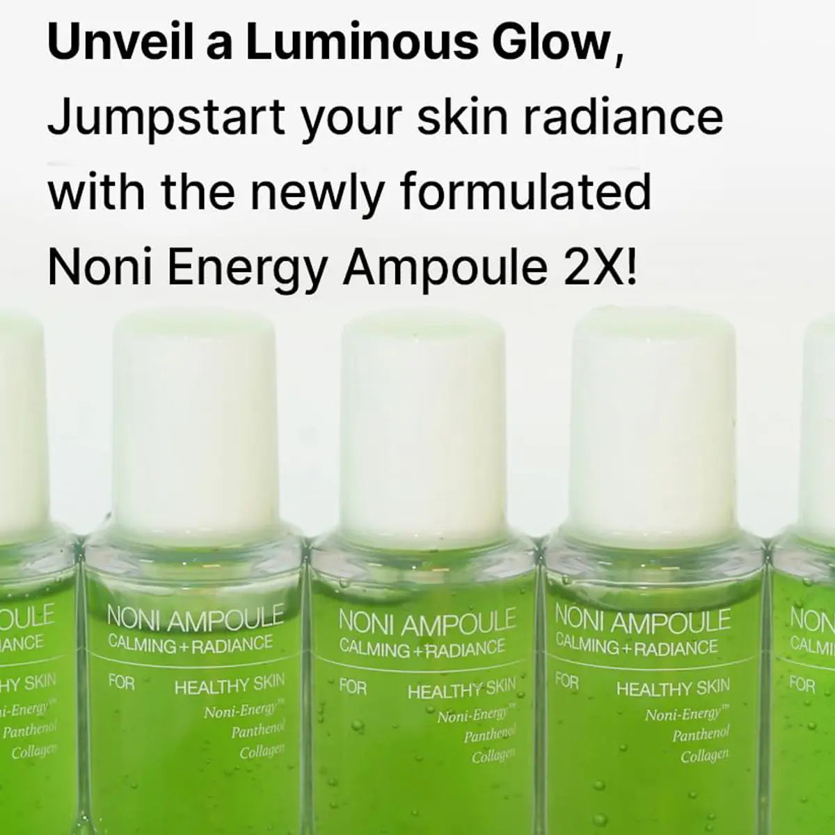 Green ampoules with white caps labeled 'Noni Ampoule' on a white background.