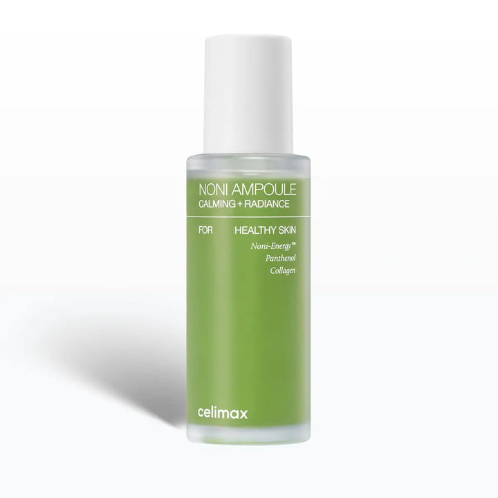 Green ampoule bottle with white cap on a white background