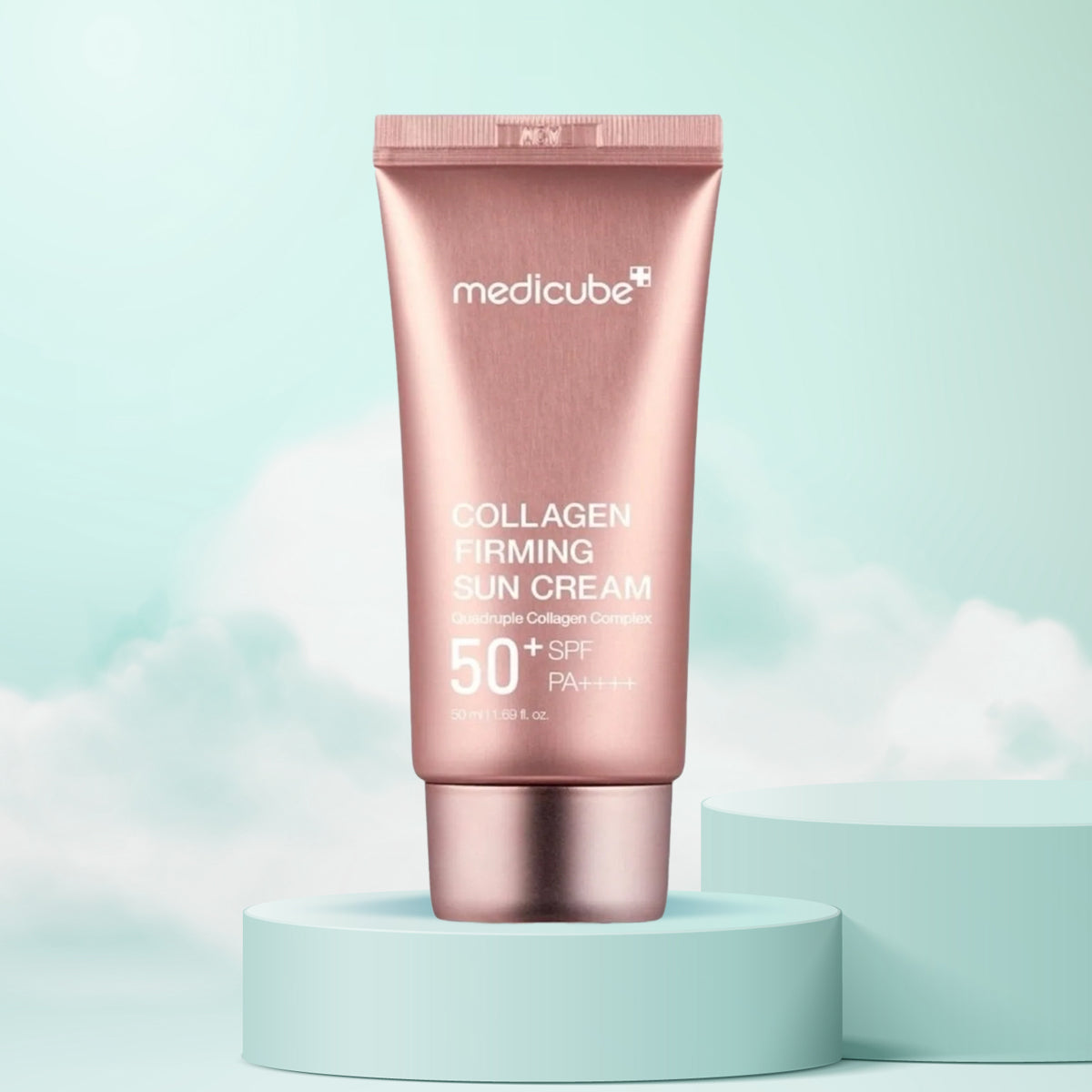 Medicube Collagen Firming Sun Cream tube on a light blue background