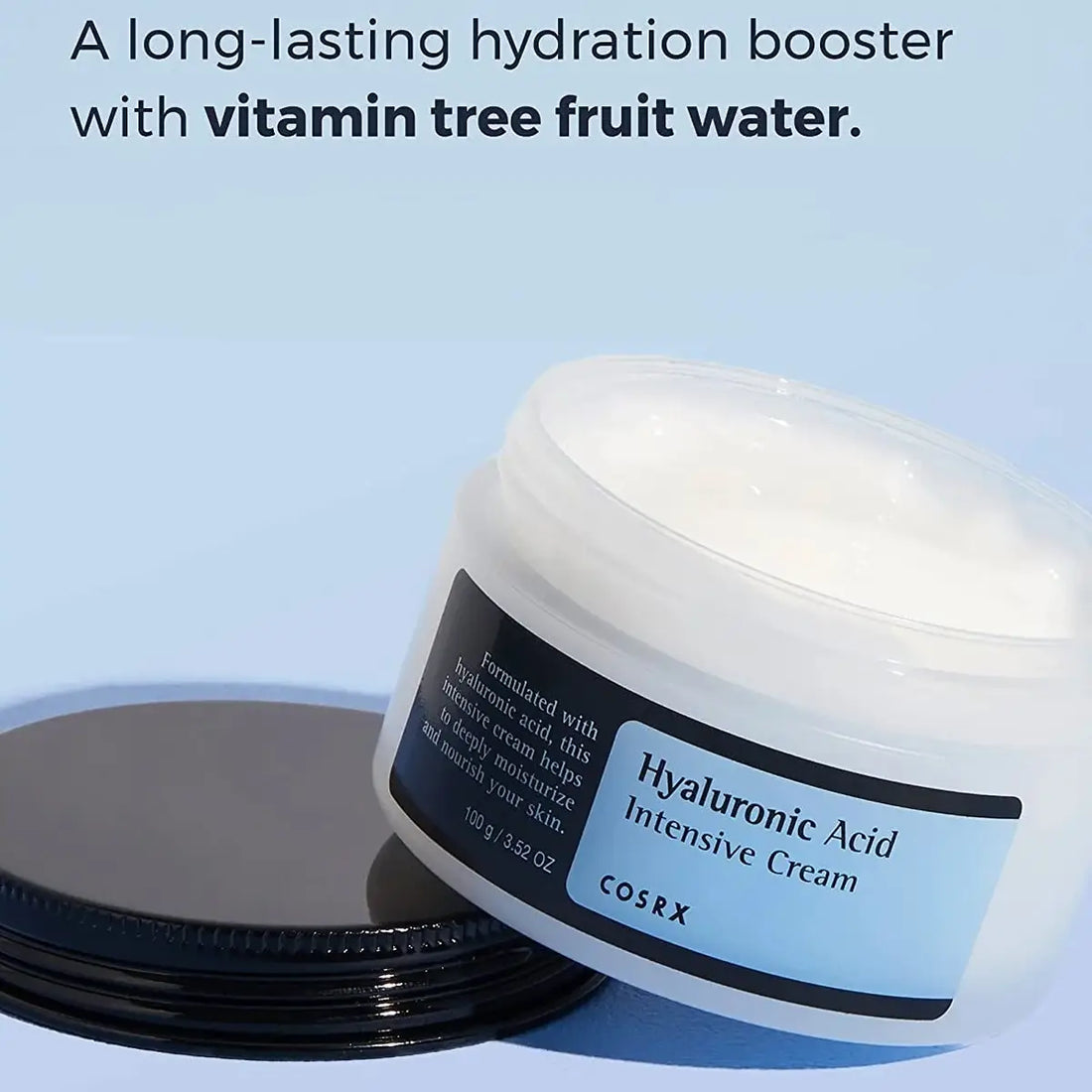 COSRX Hyaluronic Acid Intensive Cream jar on a light blue background
