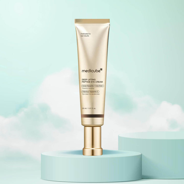 Medicube Peptide Eye cream tube on a light blue background