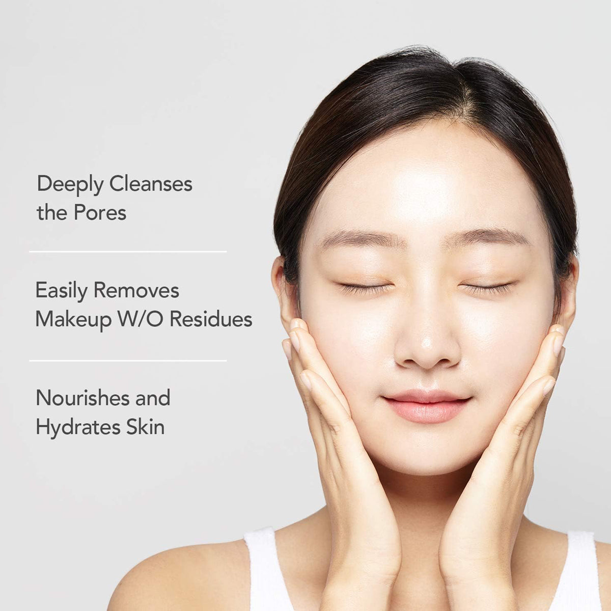 Woman with clean skin holding her face, with text about skincare benefits on a light gray background