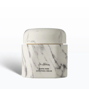 Marble-patterned cream jar with 'Dr. Athea' branding on a white background