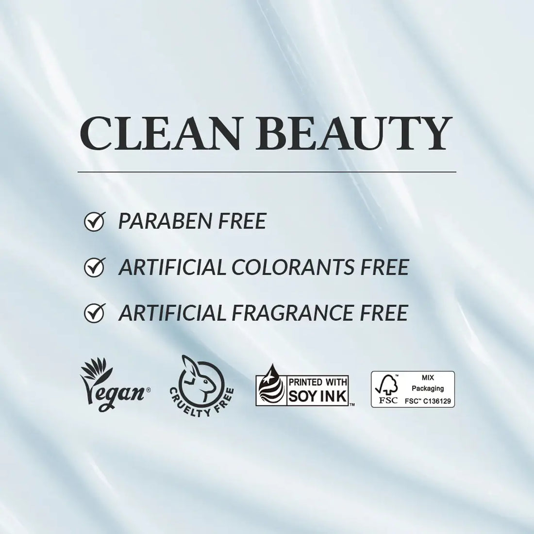 Clean beauty product label with certifications on a light blue background