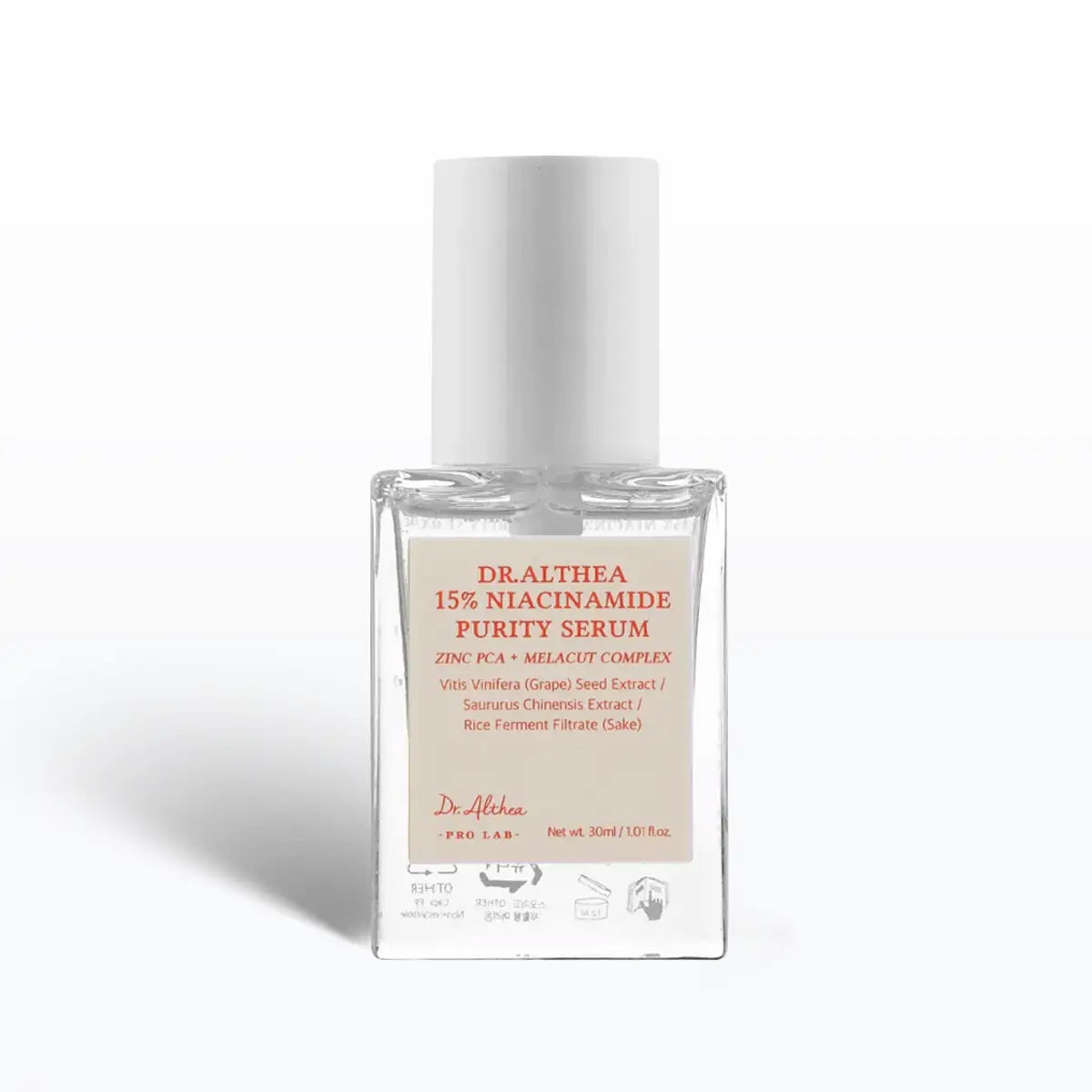 Serum bottle with white cap and beige label on a white background