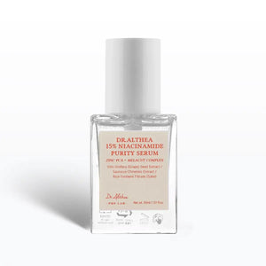 Serum bottle with white cap and beige label on a white background