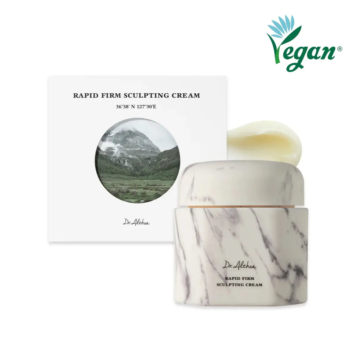 Marble-textured cream jar with 'Vegan' label and mountain landscape on a white background