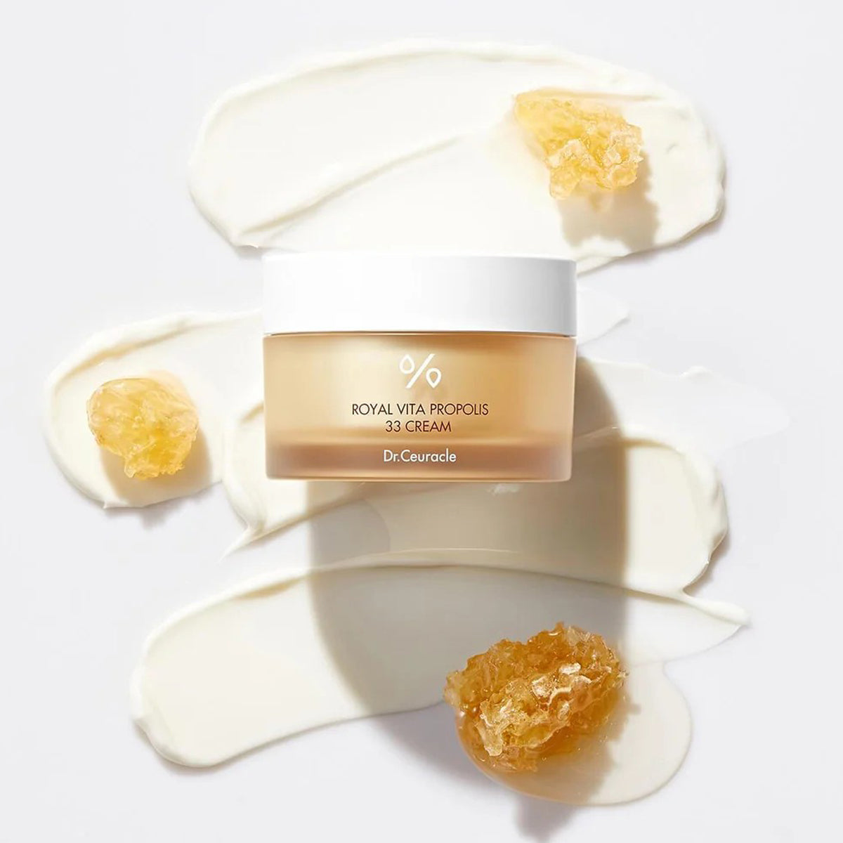 Dr. Ceuracle Royal Vita Propolis 33 Cream with honeycomb on a white background
