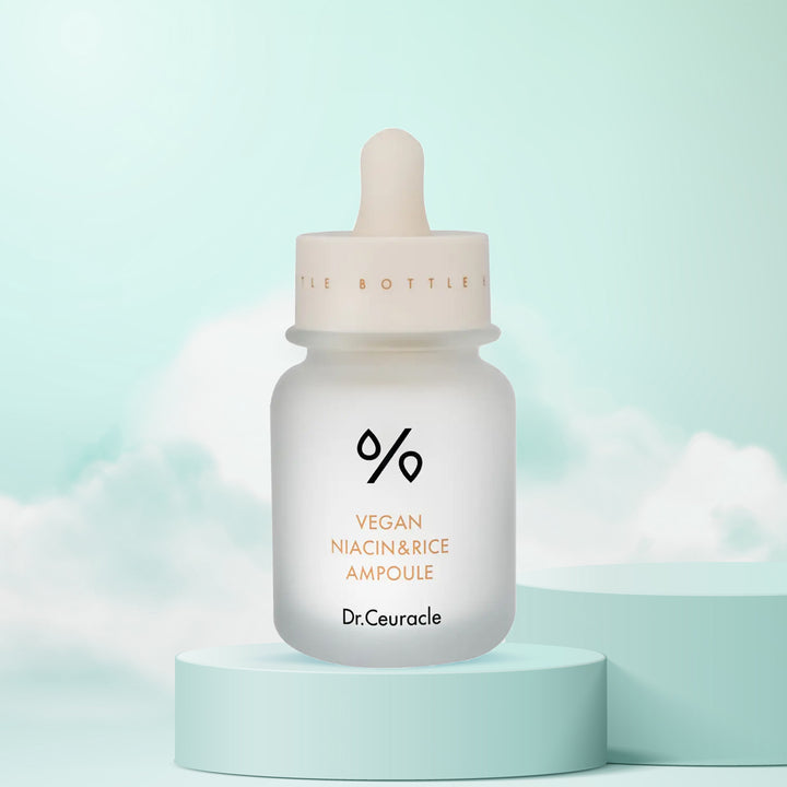Dr. Ceuracle Vegan Niacin & Rice Ampoule bottle on a light blue background