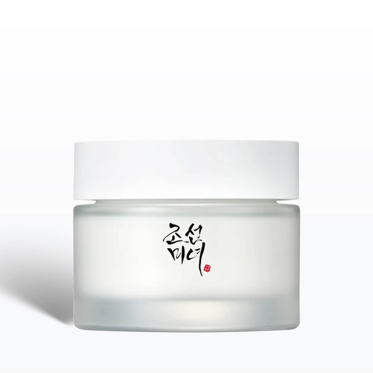 White jar of cream with black text on a white background