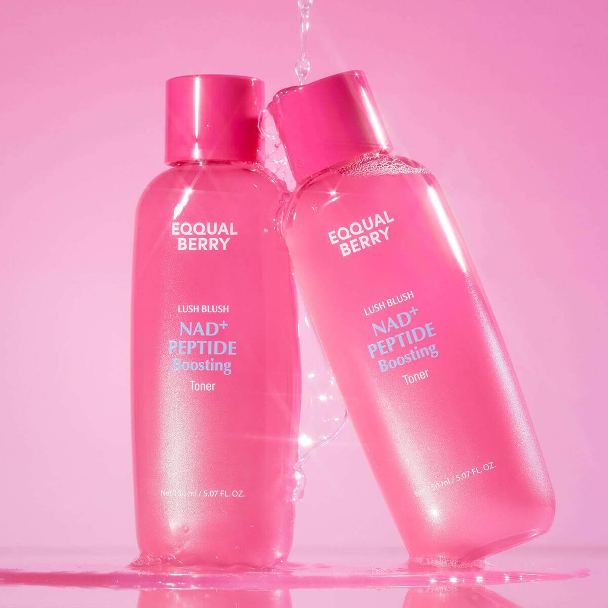 Two bottles of Eqqualberry NAD+ Peptide Boosting Toner with a pink background, promoting hydration and skin firmness.