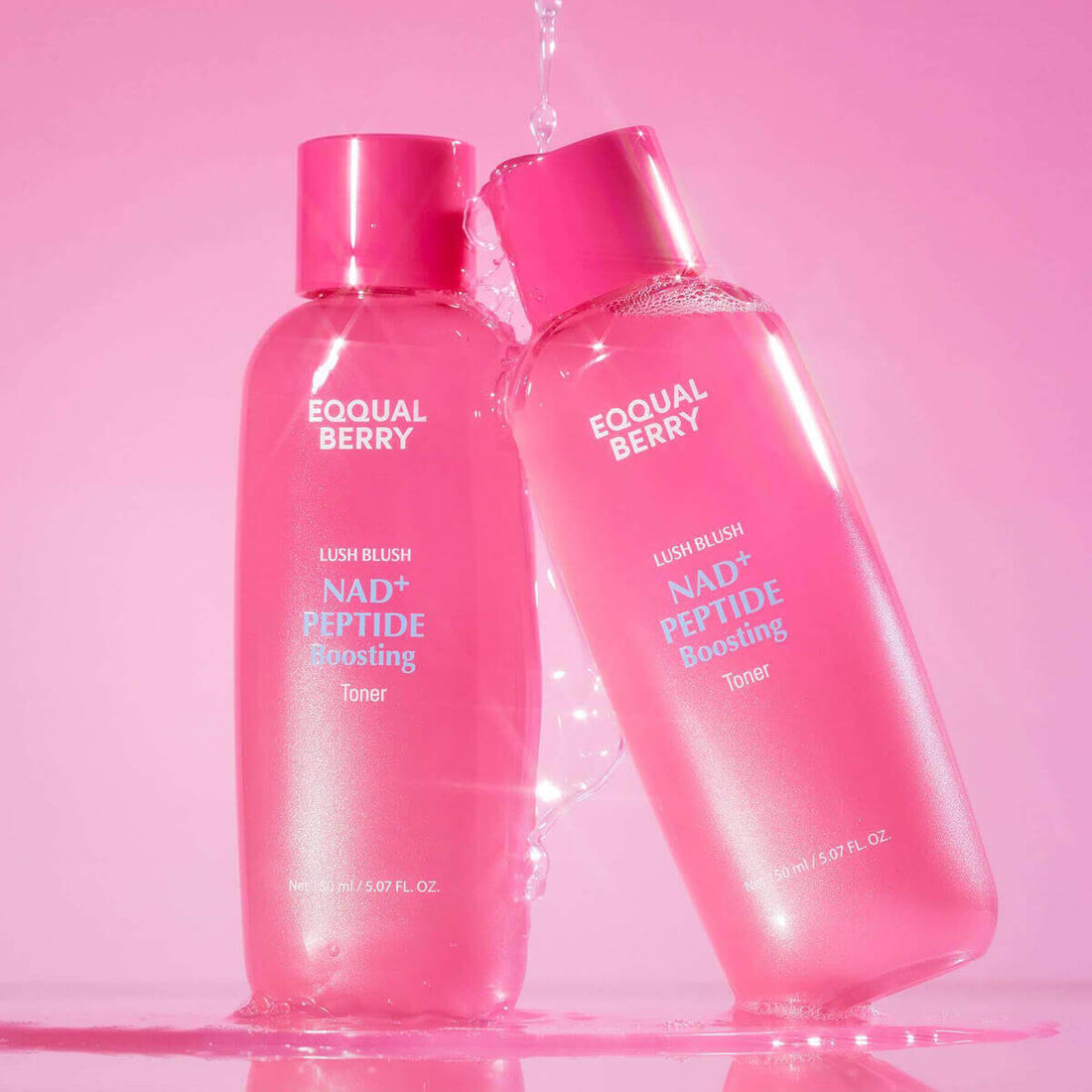 Two bottles of Eqqualberry NAD+ Peptide Boosting Toner with a pink background, promoting hydration and skin firmness.