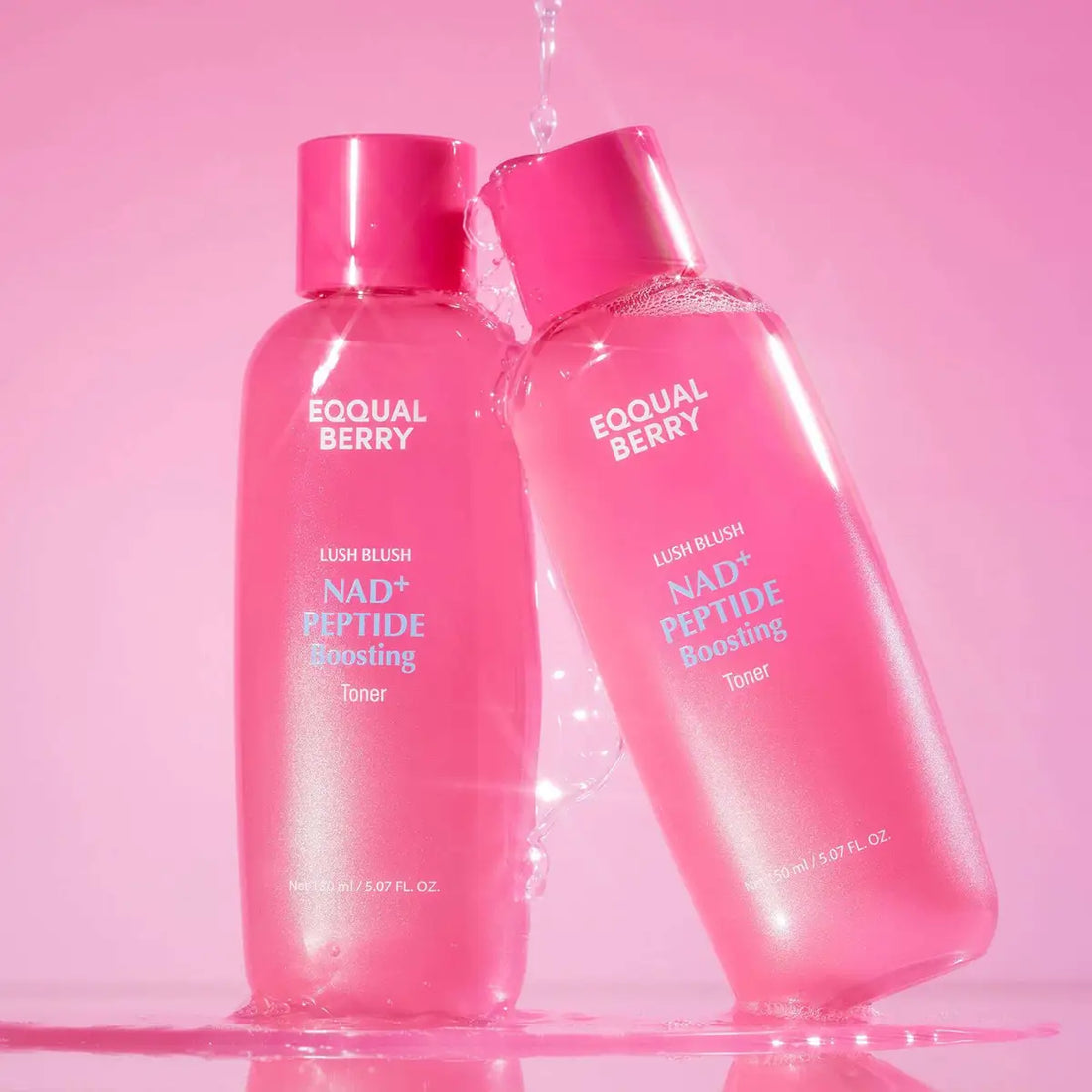 Two Eqqualberry NAD+ Peptide Boosting Toner on a pink background.