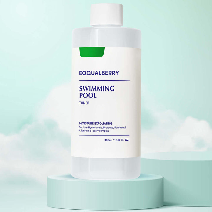 Eqqualberry Swimming Pool Toner in a clear bottle with a label featuring moisture exfoliating ingredients.