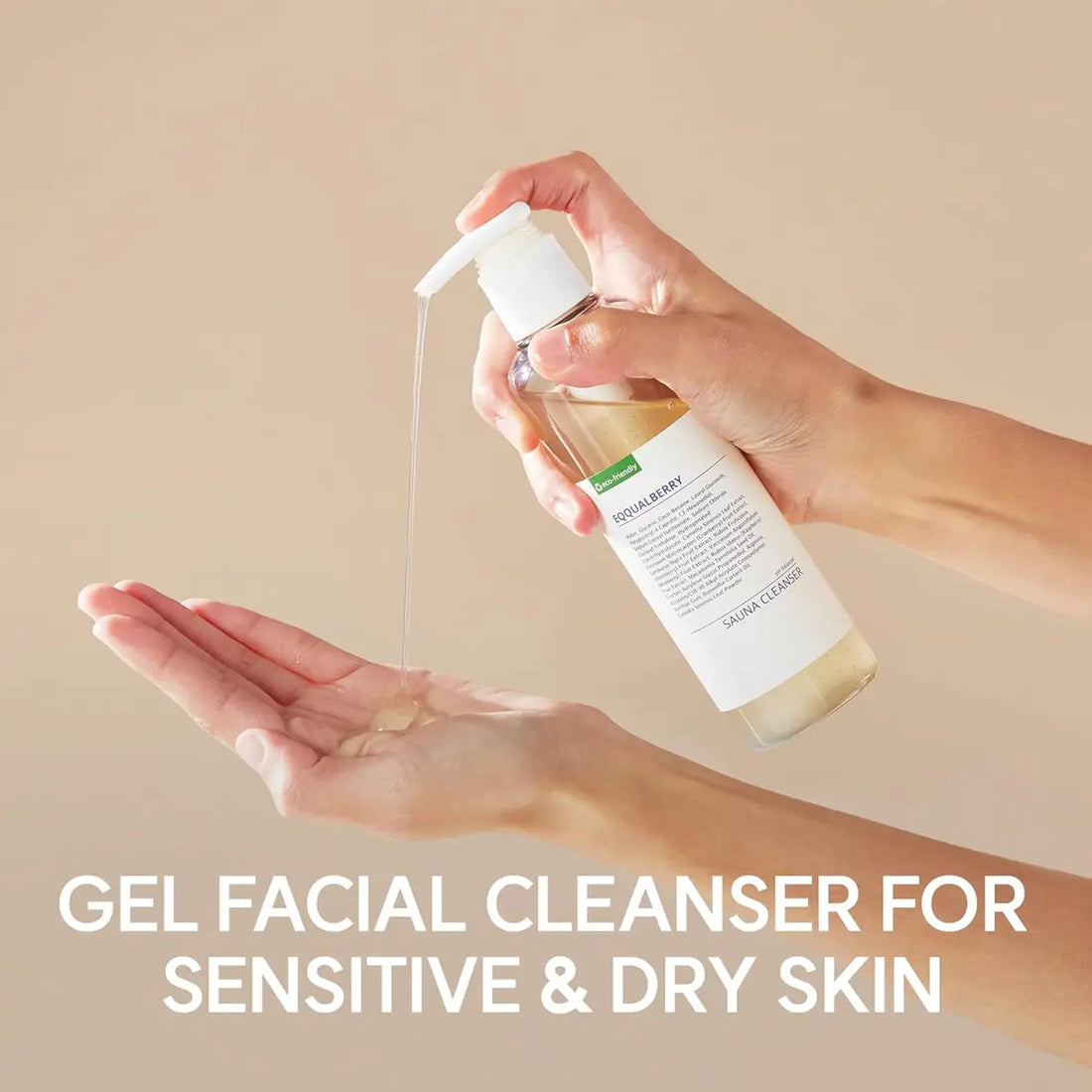 Hand holding a bottle of Eqqualberry pH-Balanced Sauna Cleanser over another hand with a beige background
