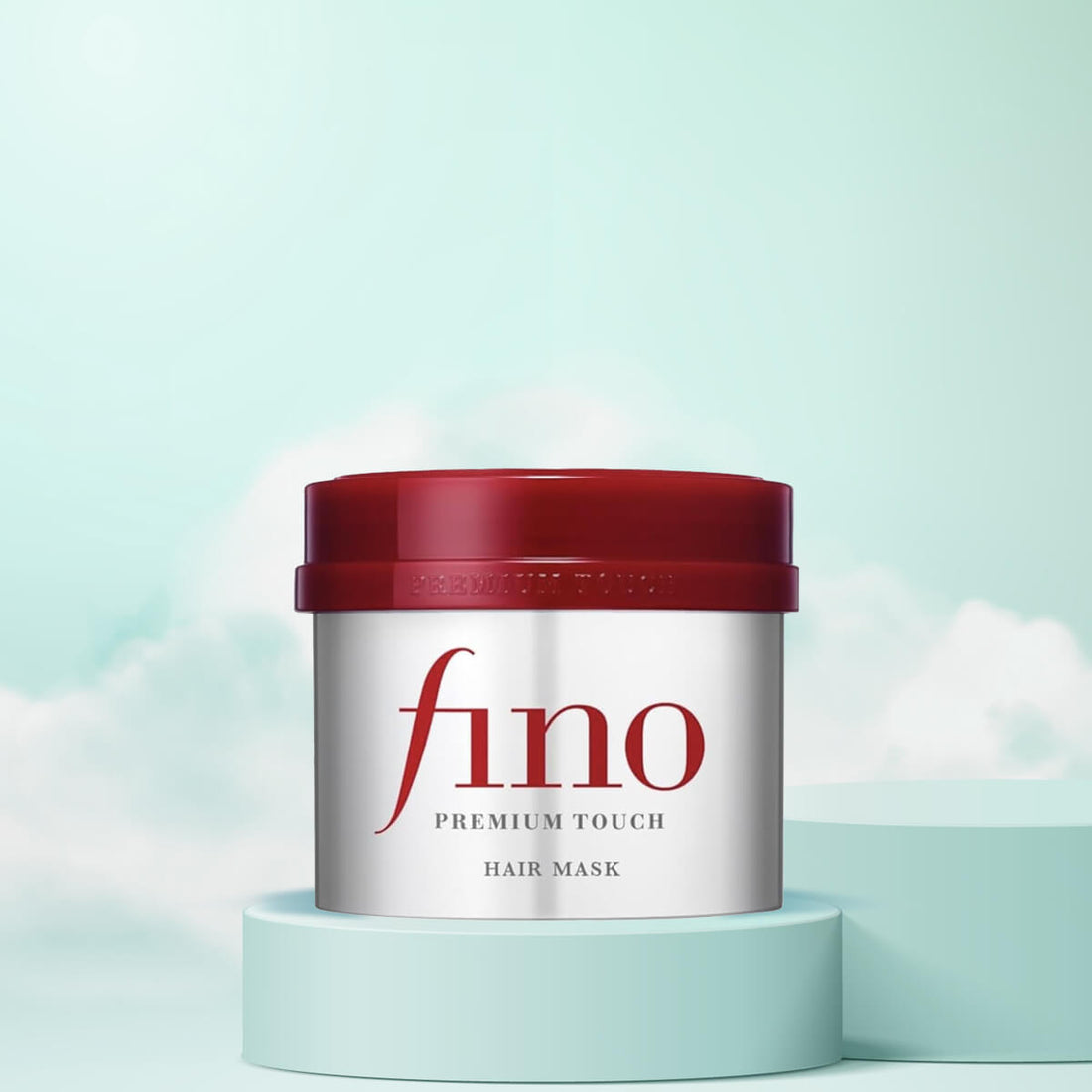 Fino Premium Touch hair mask jar with red lid on a light blue background