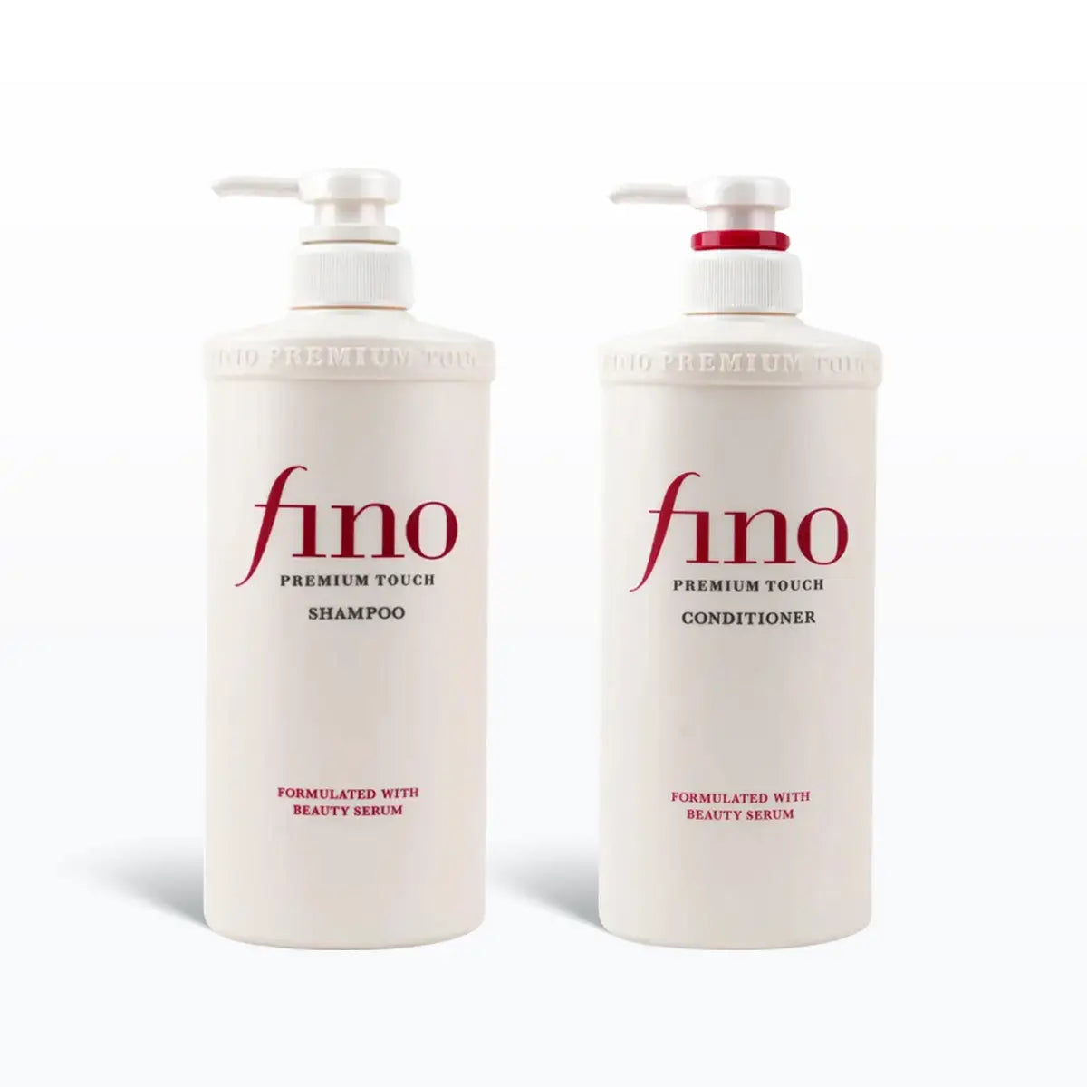Two bottles of fino shampoo and conditioner on a white background