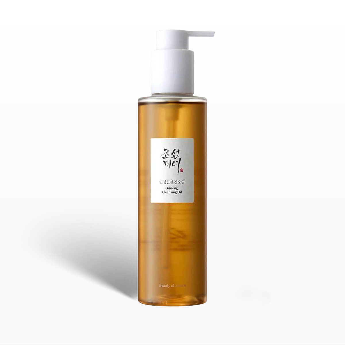 Bottle of cleansing oil with a pump on a white background