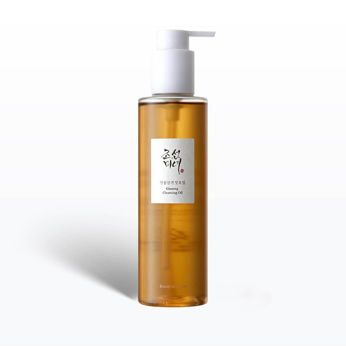 Bottle of cleansing oil with a pump on a white background