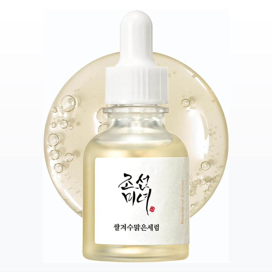 Skincare serum bottle with dropper on a white background