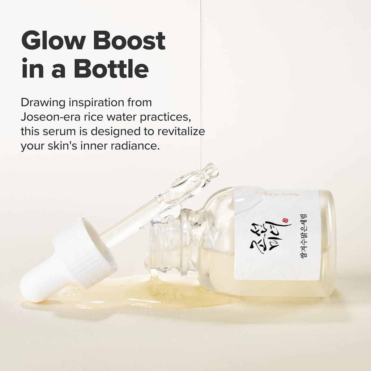 Serum bottle with dropper labeled 'Glow Boost in a Bottle' on a light background