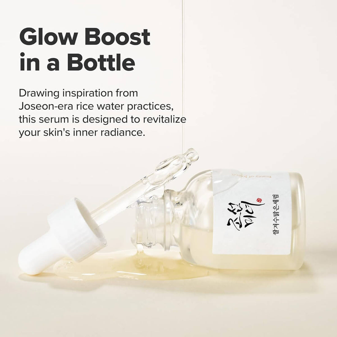 Serum bottle with dropper labeled 'Glow Boost in a Bottle' on a light background