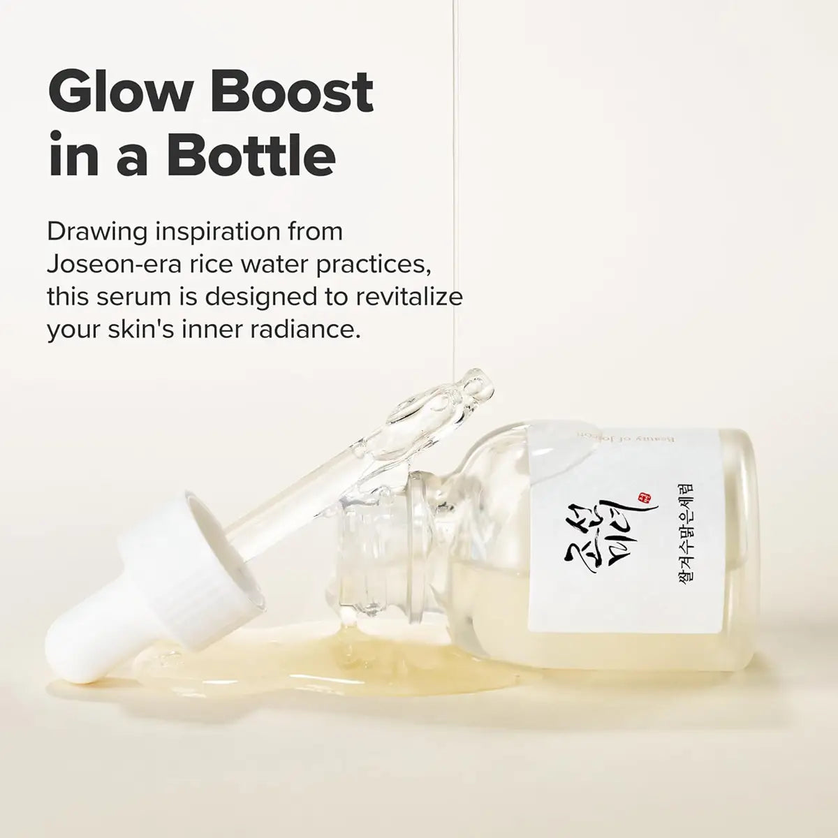 Serum bottle with dropper labeled 'Glow Boost in a Bottle' on a light background