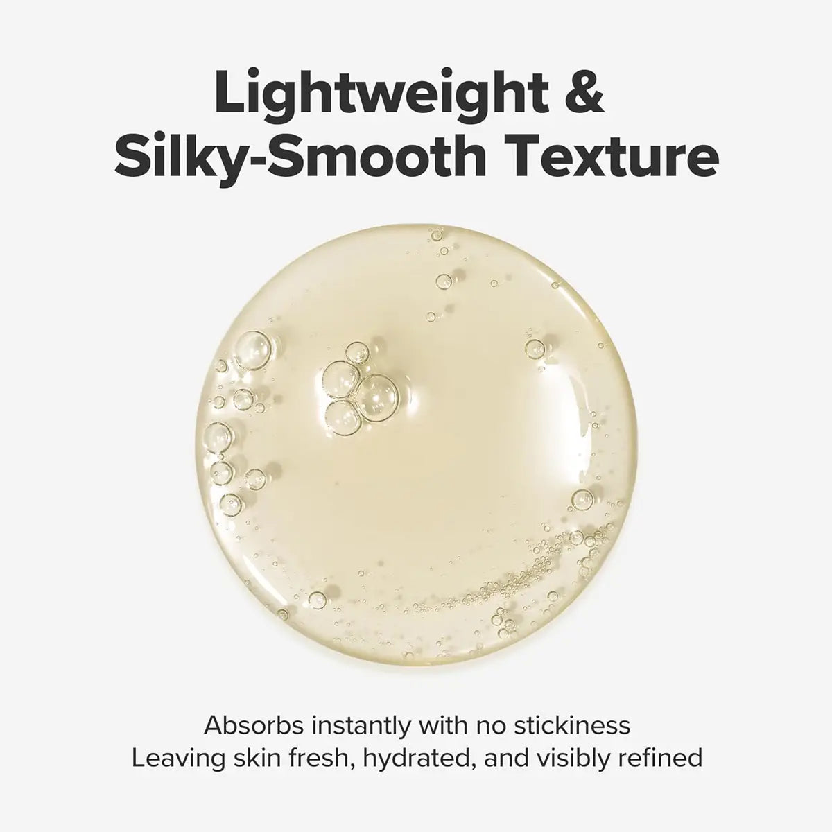 Textured skincare product with bubbles on a white background, emphasizing lightweight and silky-smooth texture.