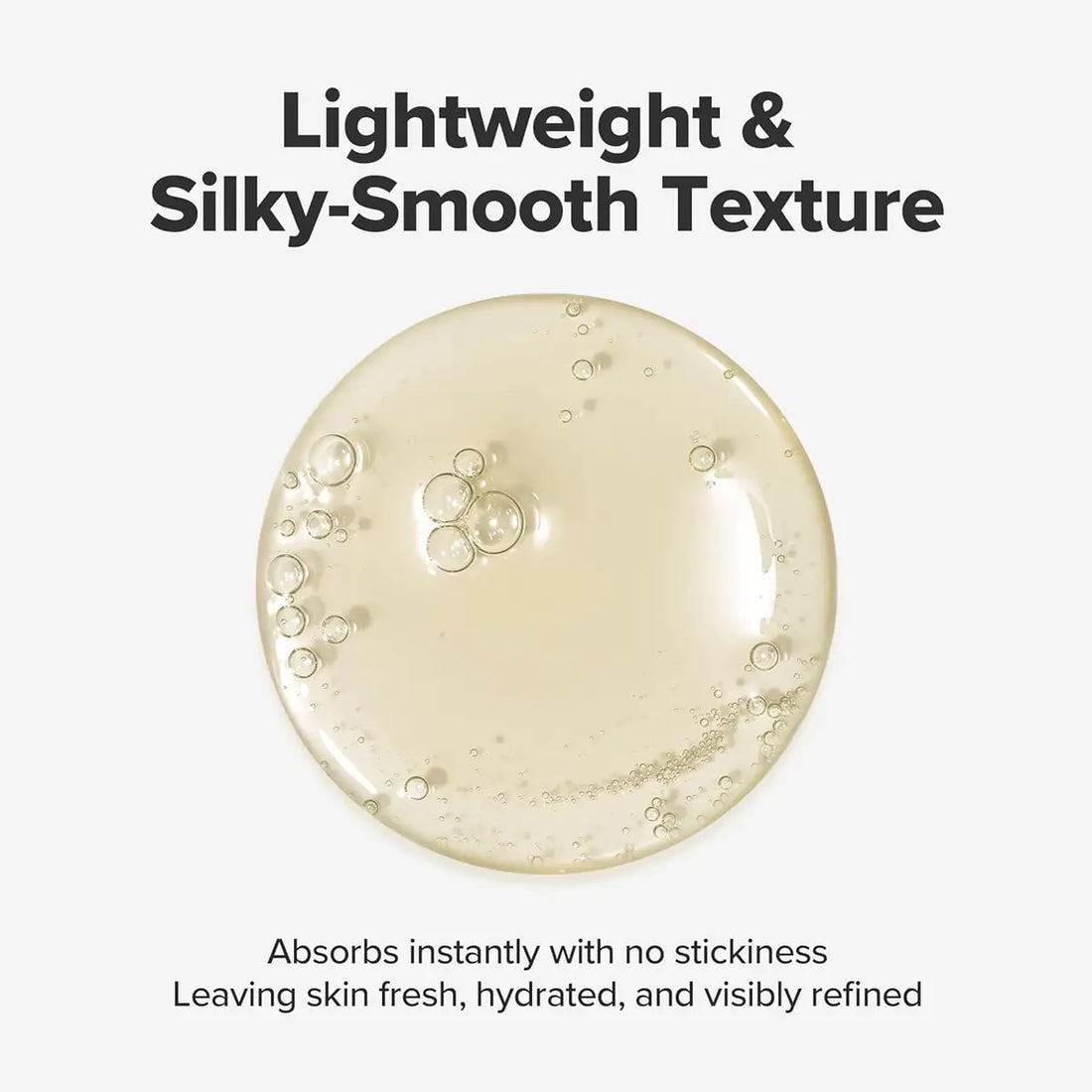 Textured skincare product with bubbles on a white background, emphasizing lightweight and silky-smooth texture.