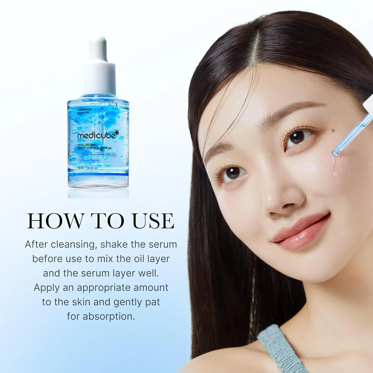 Woman applying skincare product with Medicube serum bottle on a light blue background