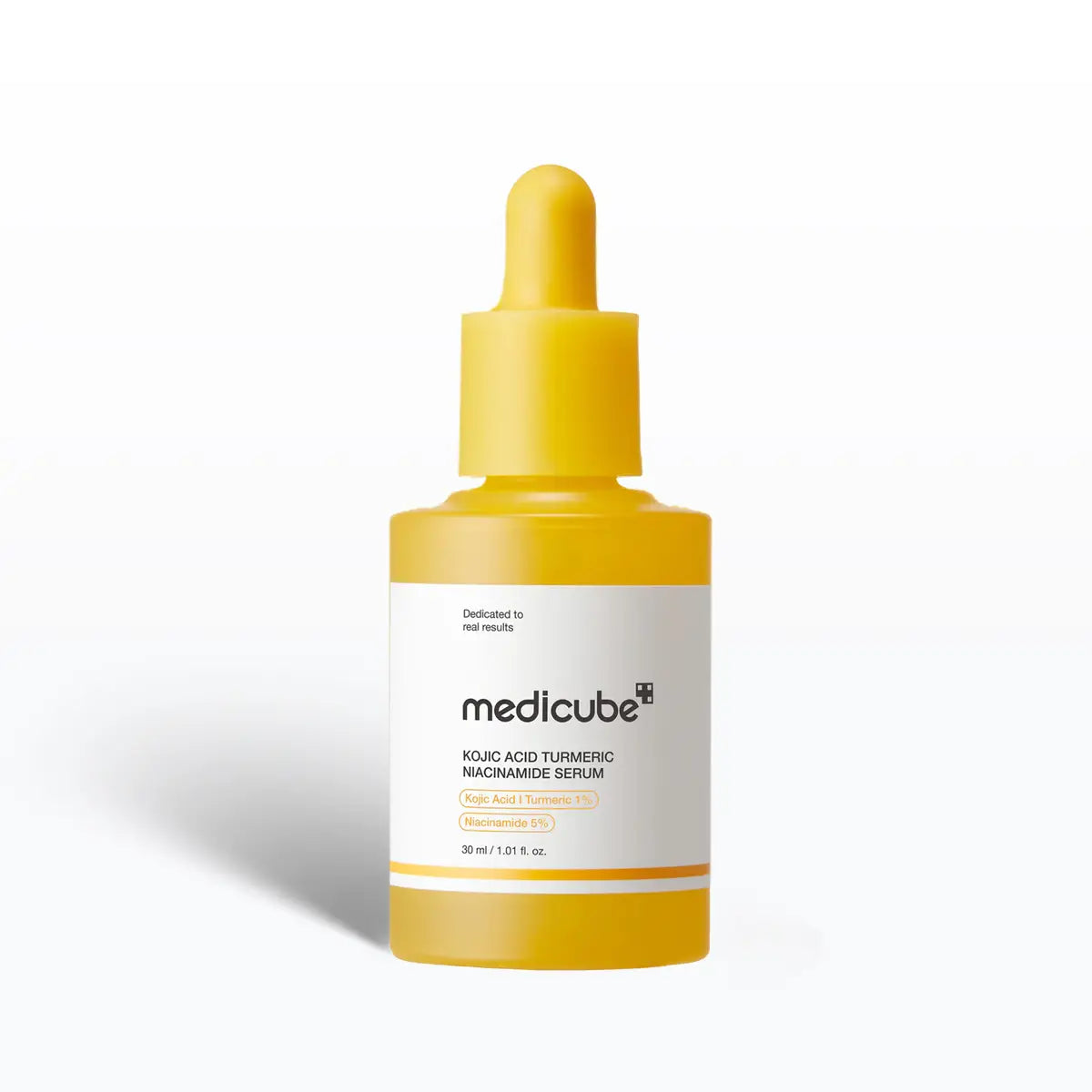 Medicube skincare serum bottle with yellow dropper on a white background