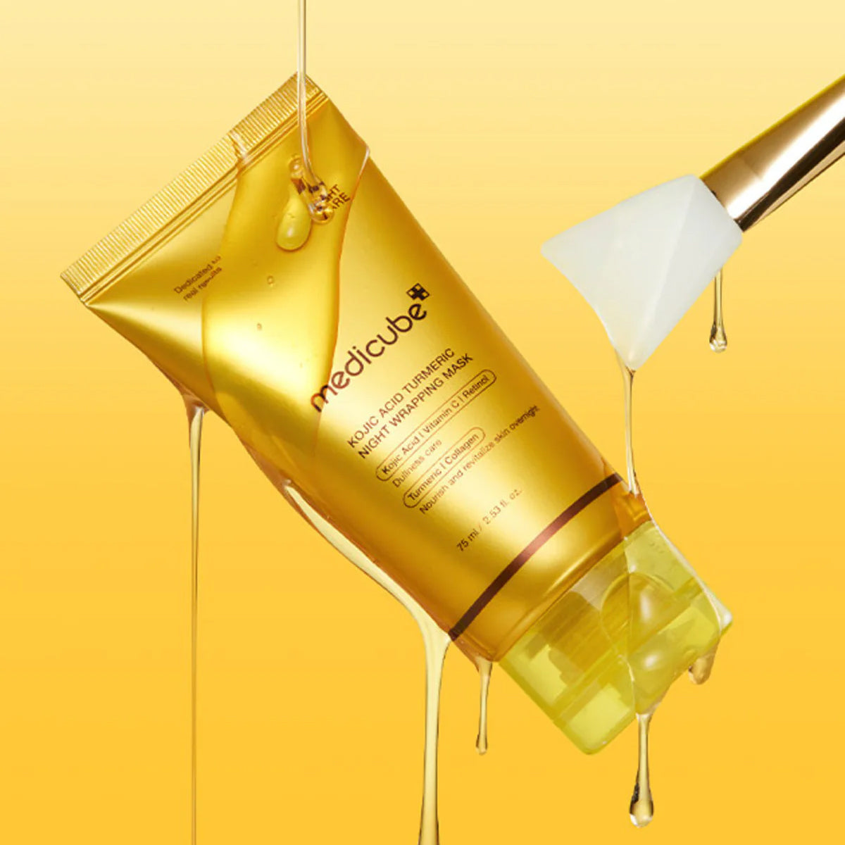 Medicube skincare product with dropper on a yellow background