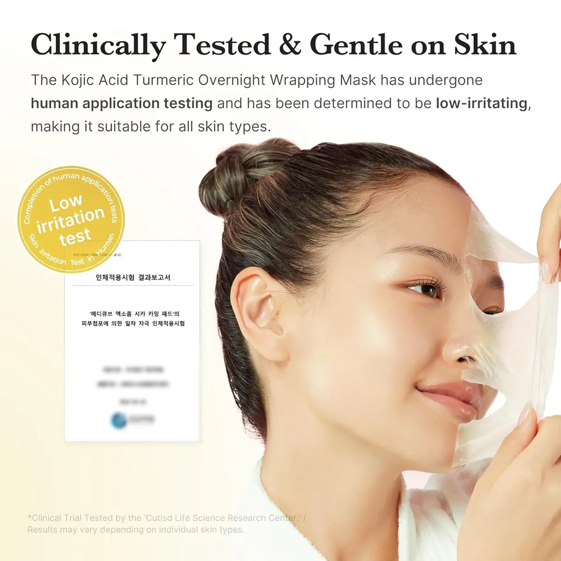 Woman applying a face mask with text about clinical testing and skin compatibility.