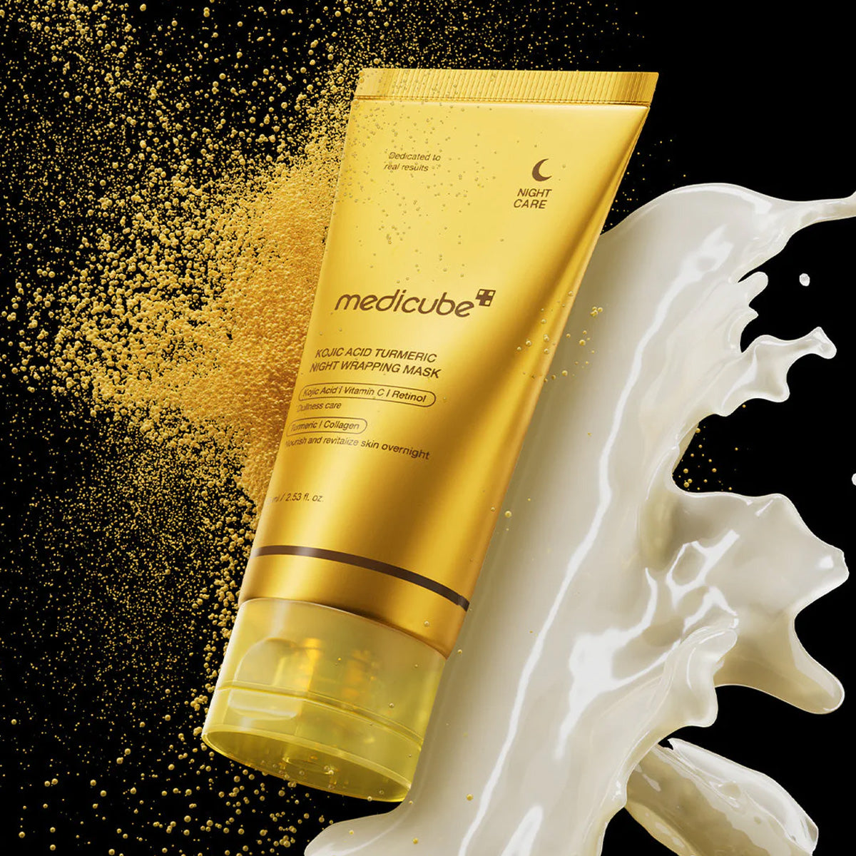 Gold tube of Medicube night wrapping mask with gold powder and white liquid on a black background