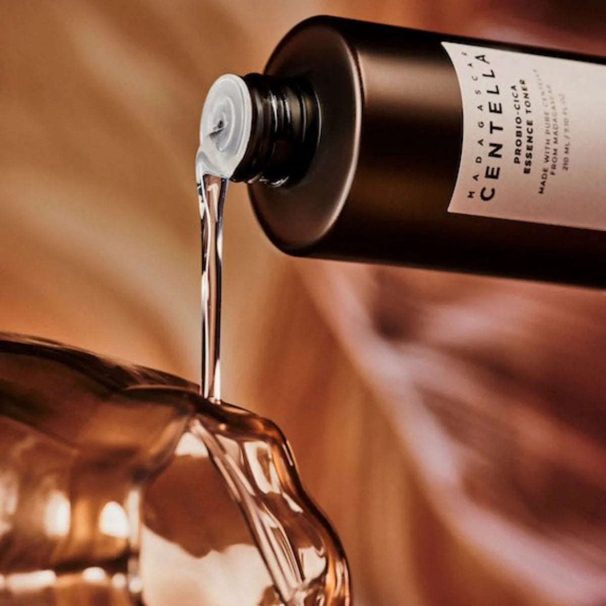 Madagascar Centella Probio-Cica Essence Toner by Skin1004 | liquid pouring out