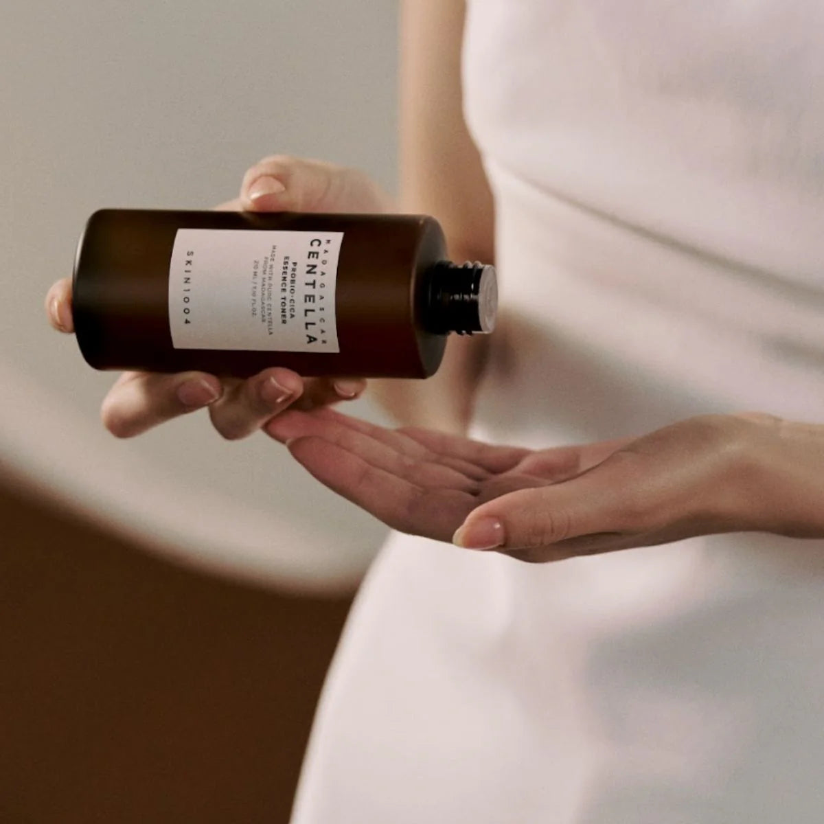 Madagascar Centella Probio-Cica Essence Toner by Skin1004 | pouring on hand