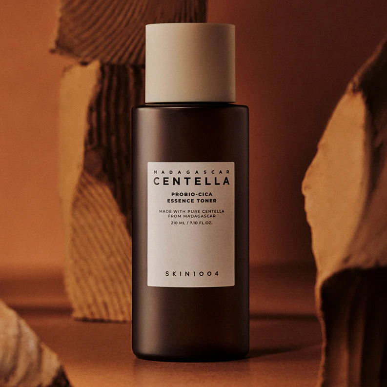 Madagascar Centella Probio-Cica Essence Toner by Skin1004 on a wooden background