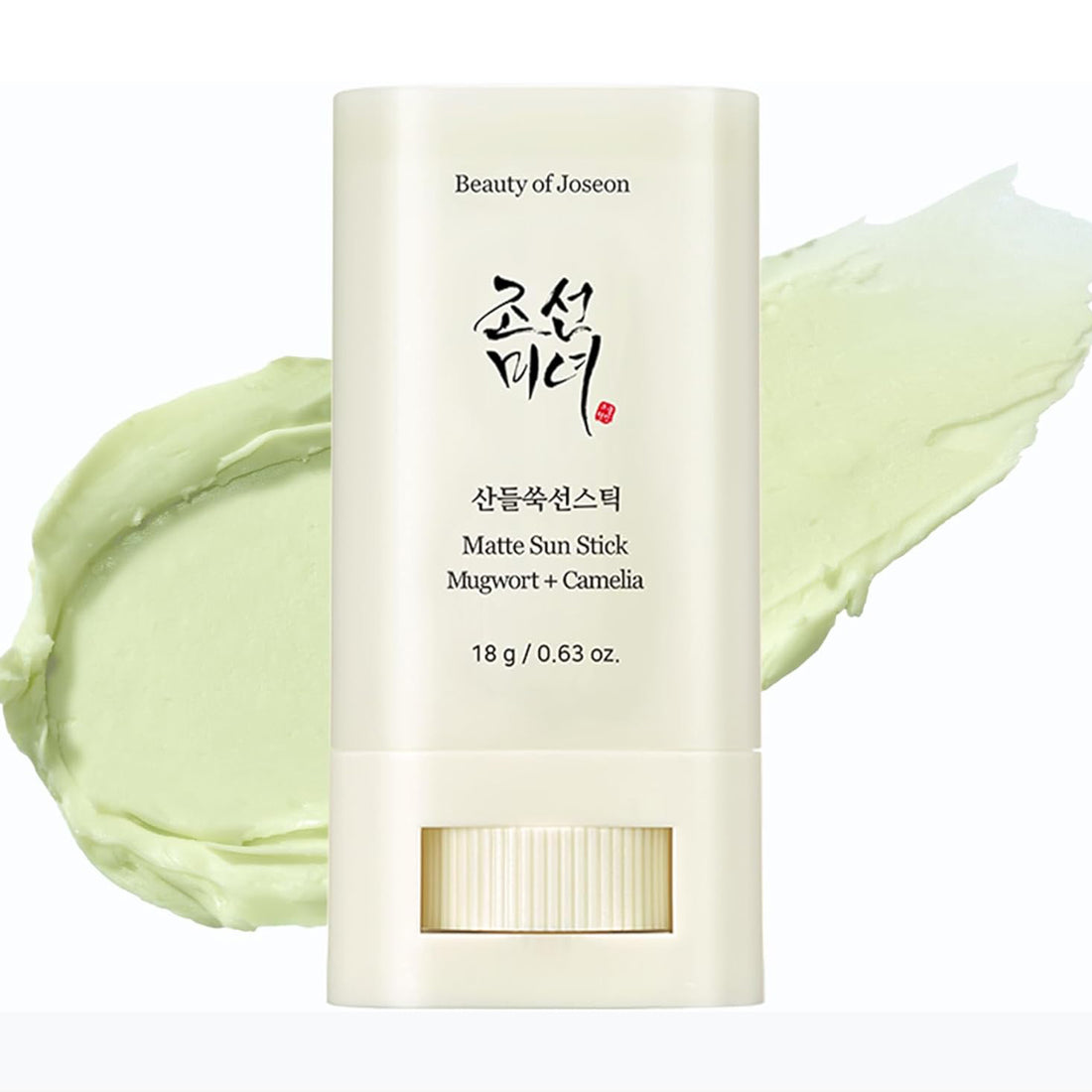 Beauty of Joseon Matte Sun Stick with green cream swatch on a white background